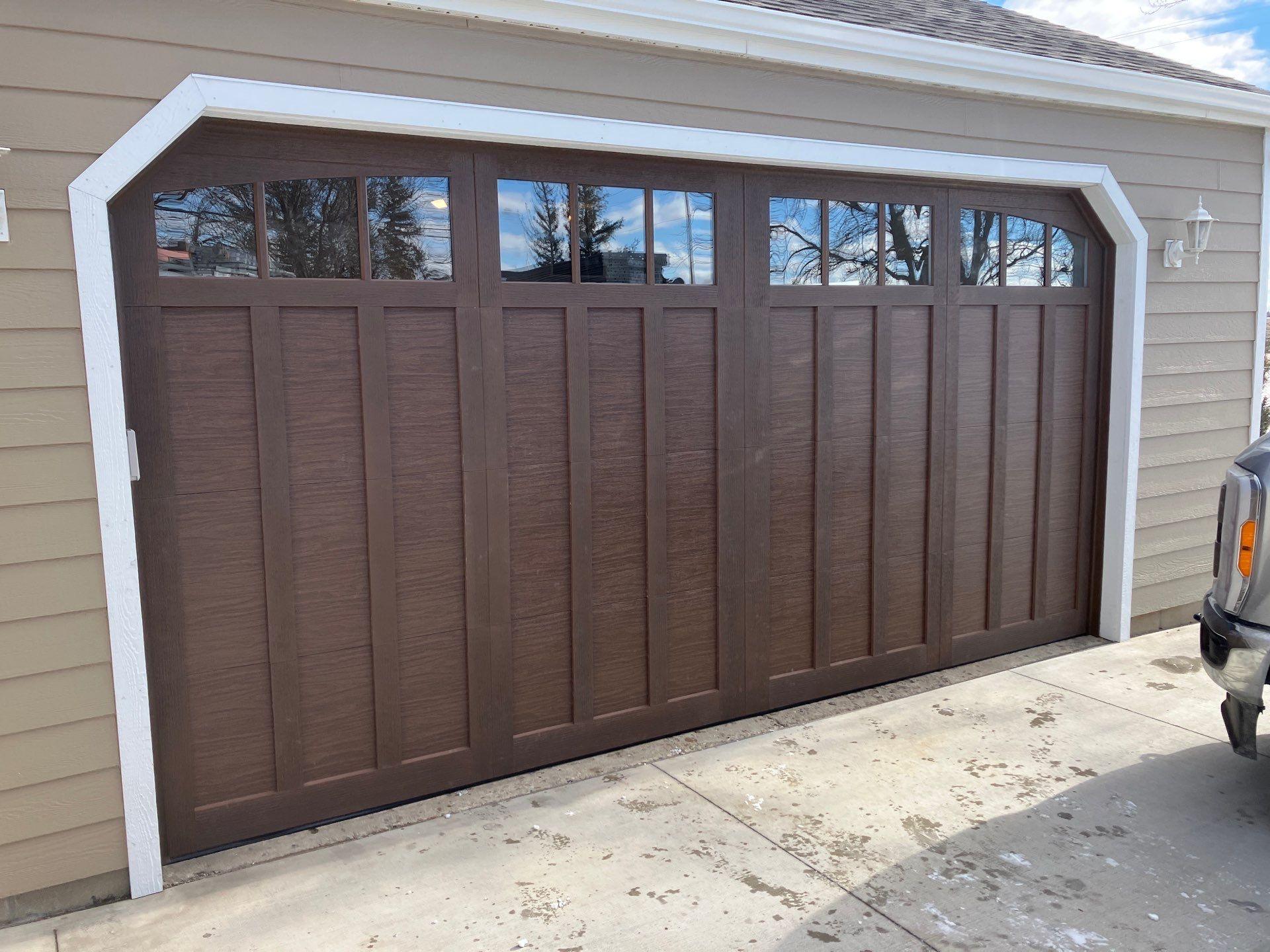 when to replace a garage door